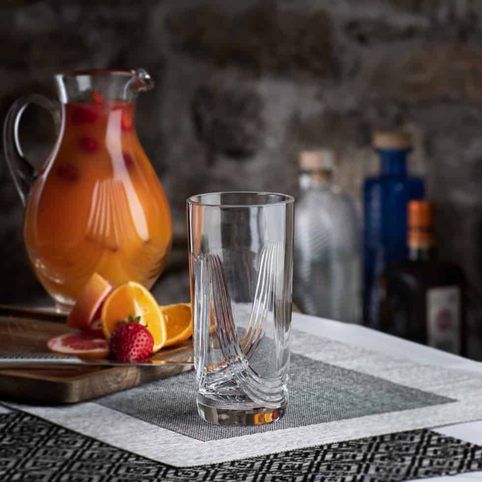 Montrose highball glass with Montrose crystal jug with cocktail filling.